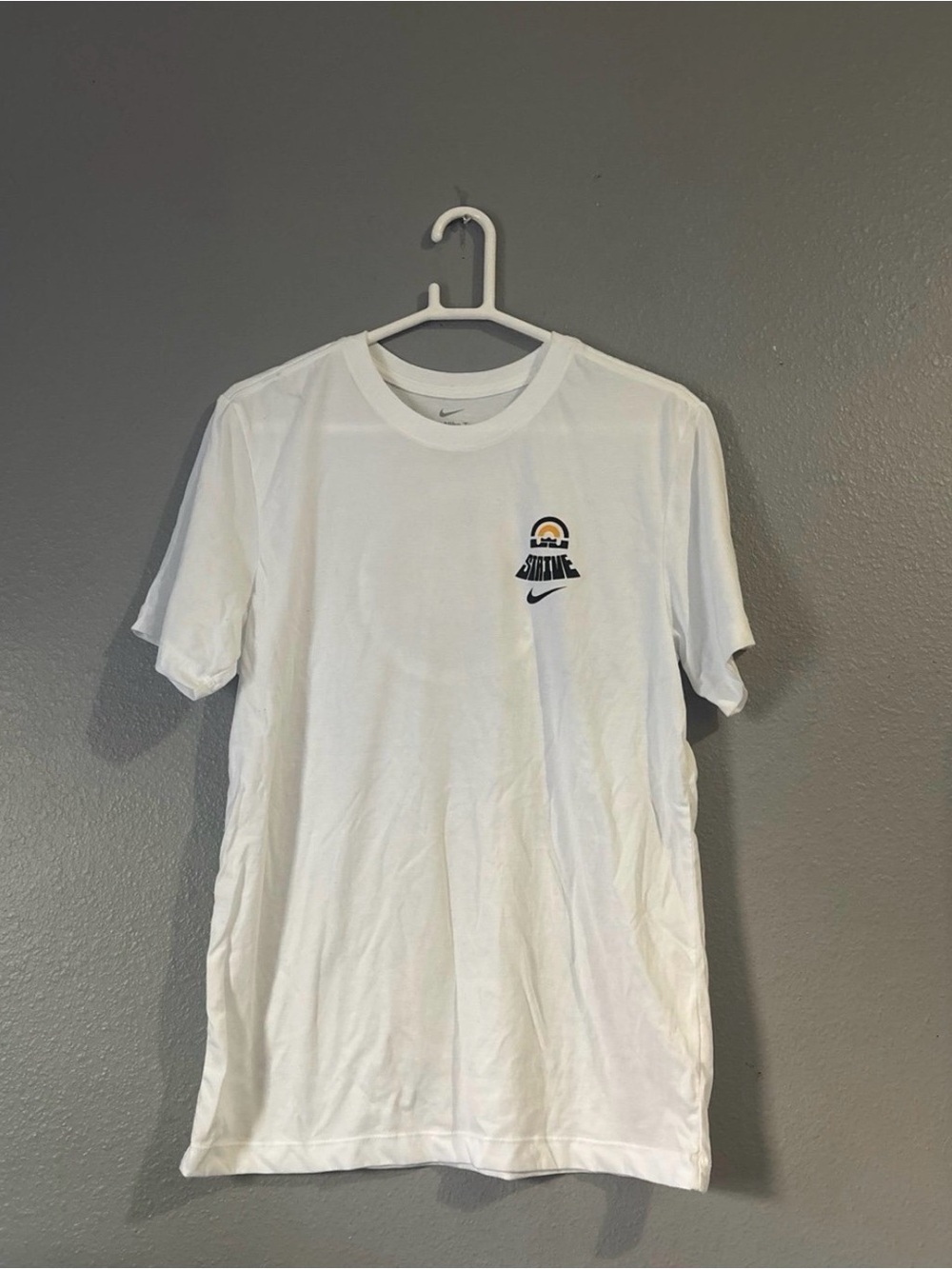Nike White Short-Sleeve Tee with Small Chest Graphic